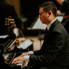 man playing piano